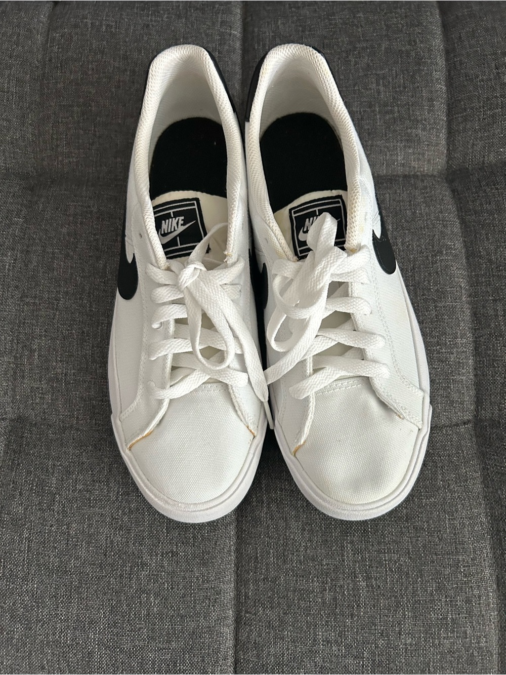 Nike White Canvas Shoes with Black Swoosh